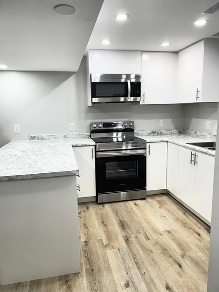Full home renovation, kitchen remodel with white cabinetry, Toronto GTA